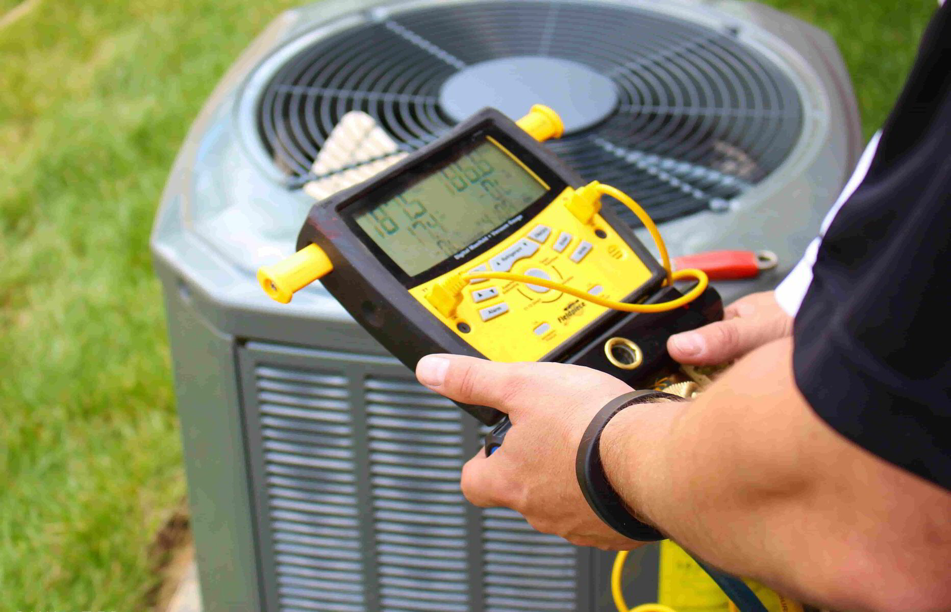 HVAC tech checking low refrigerant